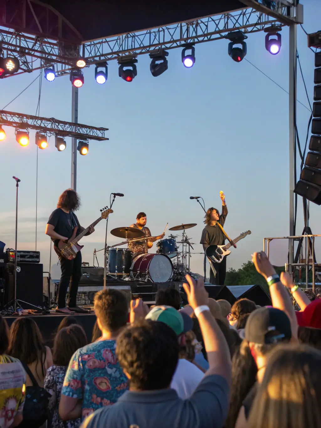 A dynamic shot of a local band performing at a COMITE DES FETES DE VILLARSEN PONS event, emphasizing the organization's support for local talent and cultural enrichment.